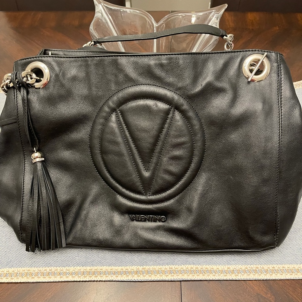 Beautiful Valentino Handbag with silver accents.